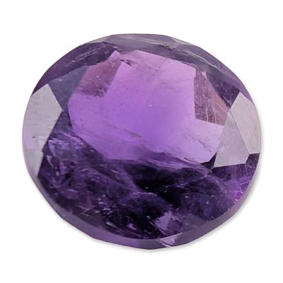 Round Faceted Amethyst Loose Gemstone. A loose gemstone that appears to be natural amethyst 
