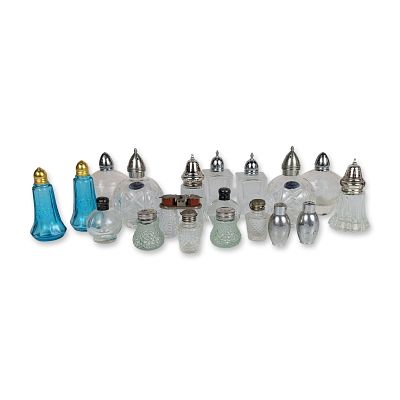 20pc Collection of Glass and Crystal Salt and Pepper Shakers. This expansive culinary table 