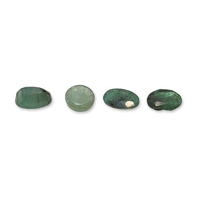 4pc Collection of Loose Faceted Emeralds. A collection of four loose faceted gemstones that 