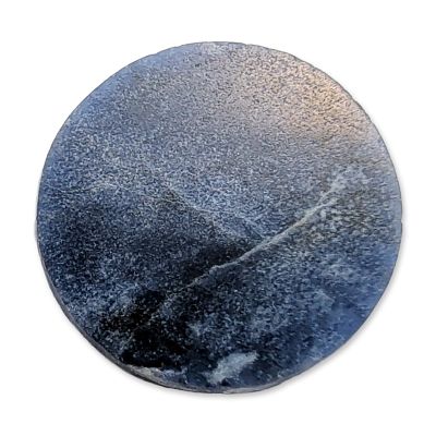 Polished Sodalite Disc Gemstone. A sodalite gemstone specimen fashioned into a polished disc 