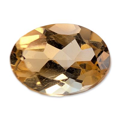 Oval Cut Faceted Yellow Spinel Gemstone. Faceted loose spinel gemstone in an oval mixed cut 