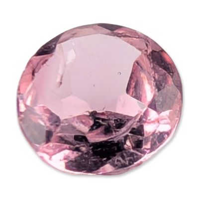 Faceted Round Brilliant Pink Gemstone. A single loose faceted gemstone of a light pastel pink 