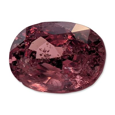 Loose Oval Mixed-Cut Pink Sapphire Gemstone. Loose faceted gemstone worked in an oval mixed-cut 