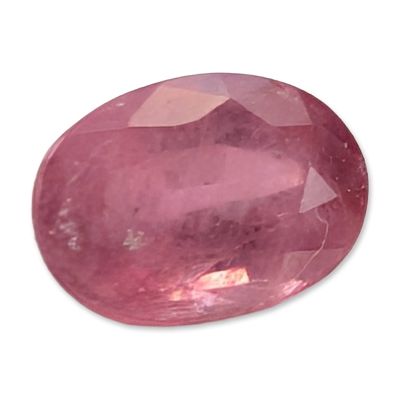 Oval Mixed Cut Pink Sapphire Gemstone. Faceted pink sapphire gemstone, featuring an oval mixed 