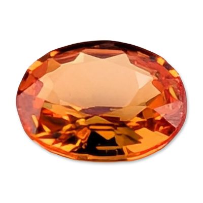 Faceted Oval Orange Gemstone. A loose faceted orange gemstone, oval brilliant-cut, appearing to 