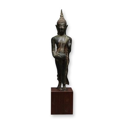 Thai Bronze Walking Buddha Sculpture. This cast bronze sculpture depicts a standing and walking 