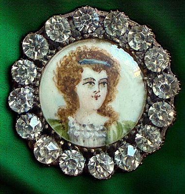 A DIVISION ONE PASTE BORDERED ELEGANT LADY BUTTON. 1 Medium size 19th century hand painted under 