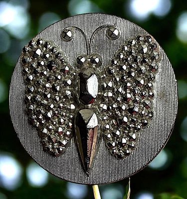 A DIVISION ONE PICTORIAL BLACK GLASS BUTTON. 1 Large 19th century silver lustered butterfly 