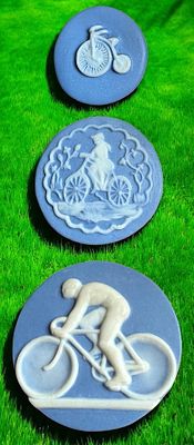 A SMALL CARD OF DIVISION THREE STUDIO BUTTONS. 3 Med/Large 20th C. Jasperware. Bicycle examples 