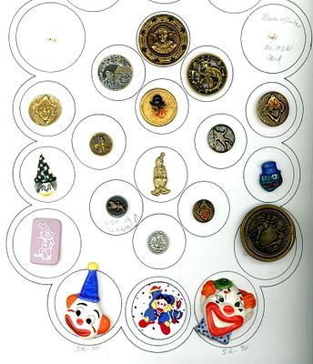 A CARD OF DIVISION ONE AND THREE CLOWN BUTTONS. 19 S/M/L 19th to 20th century assorted material 