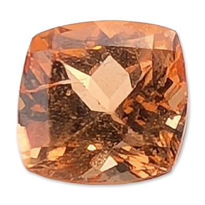 Orange Cushion Cut Loose Gemstone. Loose faceted gemstone featuring a cushion cut with a 