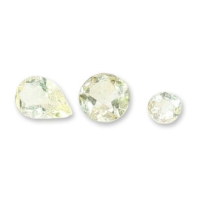 Three Loose Yellow and Near-Colorless Citrine. Trio of loose Citrine including one pear-cut and 