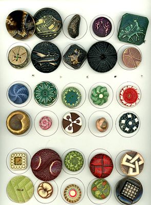 A CARD OF DIVISION THREE ASSORTED CELLULOID BUTTONS. 30 Medium/Large 20th century examples 