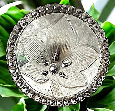 A DIVISION ONE PICTORIAL LACY GLASS BUTTON. 1 Medium 19th century scarce size leaf on round 