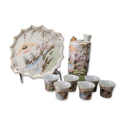 Japanese Kutani Porcelain Landscape Sake Set. Japanese porcelain sake set in the Kutani style 