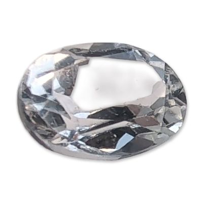 White Sapphire Oval Cut Gemstone. White sapphire gemstone in an oval faceted cut. Tested with 