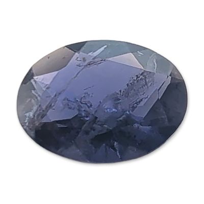 Oval Cut Natural Iolite Gemstone. A loose oval-cut faceted iolite gemstone of deep blue-violet 