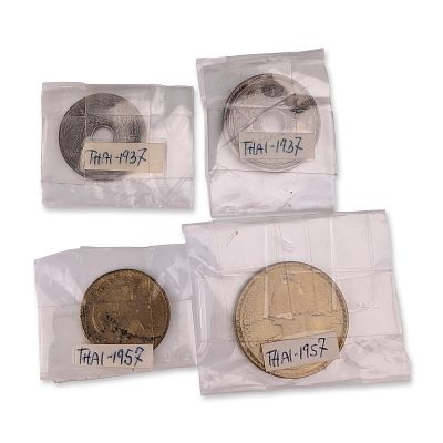 Group of Four Thai Satang Coins, 1937 and 1957. Group of circulated coins from Thailand 
