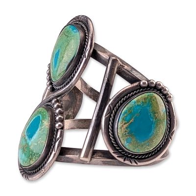 Southwestern Style Turquoise Sterling Silver Cuff Bracelet. A sterling silver cuff bracelet 