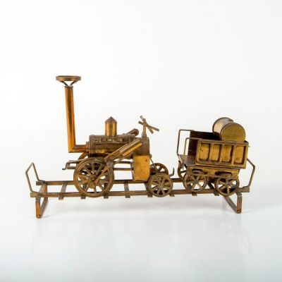 Brass Model Rocket Train with Tender and Rail. The rocket train and tender feature brass 