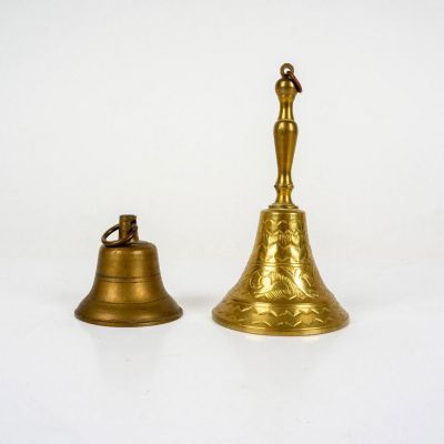2pc Brass Bells. Lovely set of brass bells one with engraved foliage and geometric decorations. 
