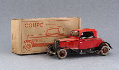 Заводной красный автомобиль купе фирмы Chad Valley. Англия, 1935-1940 . Заводной красный 