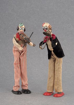 Заводные клоуны на ходулях, скрипач и тромбонист, фирмы TPS. Япония, 1950-1960-е. Завод 