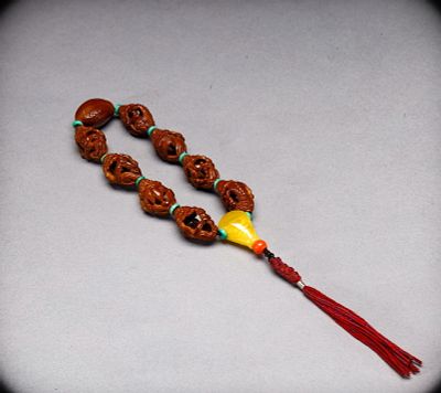 Qing Dynasty olive stone Arhat hand string. Length: 3.2cm, Width: 2cm, Weight: 35g