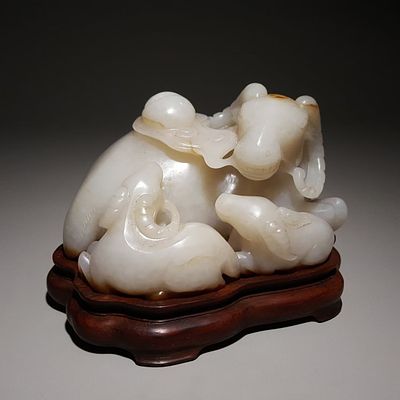 Hotan Jade Sanyang Kaitai in Qing Dynasty. Height: 6.6cm, Width: 11.5cm, Weight: 834g