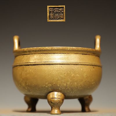 Ming Dynasty brass tripod furnace. Height: 10cm, Width: 11cm,