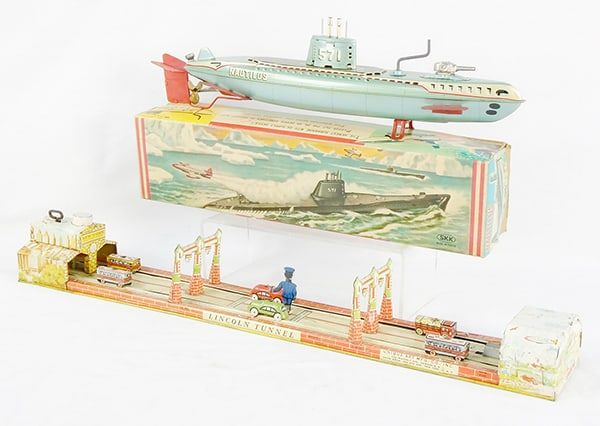 Lot 446: 2 TIN TOYS