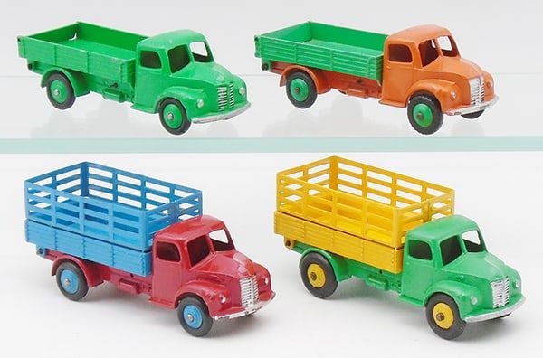 Lot 280: 4 DINKY DODGE TRUCKS