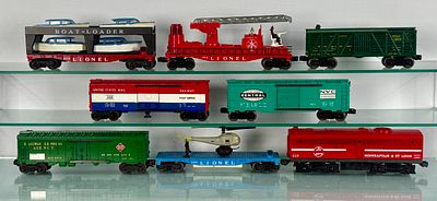 8 Lionel Model Train Cars. A collection of 8 Lionel Post-War O-gauge model train cars. The cars 