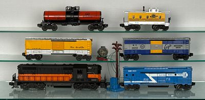 Lionel Train Set. Lionel O-gauge model trains and accessories. The lot comprises a Milwaukee 