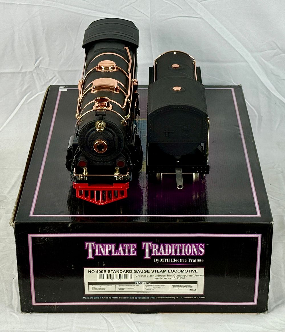 Lot 317: MTH Electric Trains Tinplate Traditions No. 400E Standard Gauge Steam Locomotive and Tender, Item No. 10-1113-1
