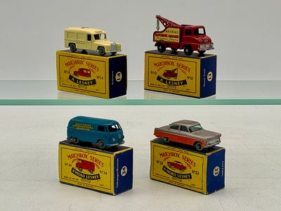 Four Matchbox Lesney vehicles. 13C5 Thames Wrecker, 14B1 Daimler Ambulance, 33A11 Ford Zodiac 