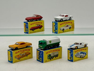 Five Matchbox Vehicles. 8E1 Ford Mustang, 20C4 Chevrolet Taxi, 32B3 Jaguar XKE, 32C2 Leyland 