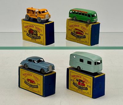 Four Matchbox Moko Lesney Vehicles. 21A1 Long Distance Coach, 43B1 Cavalier Trailer, 28A1 