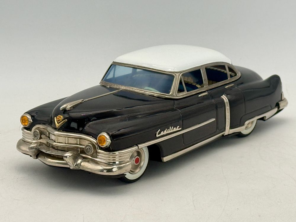 Lot 211: Marusan Japanese Tin Friction 1951 Cadillac Sedan Toy Car