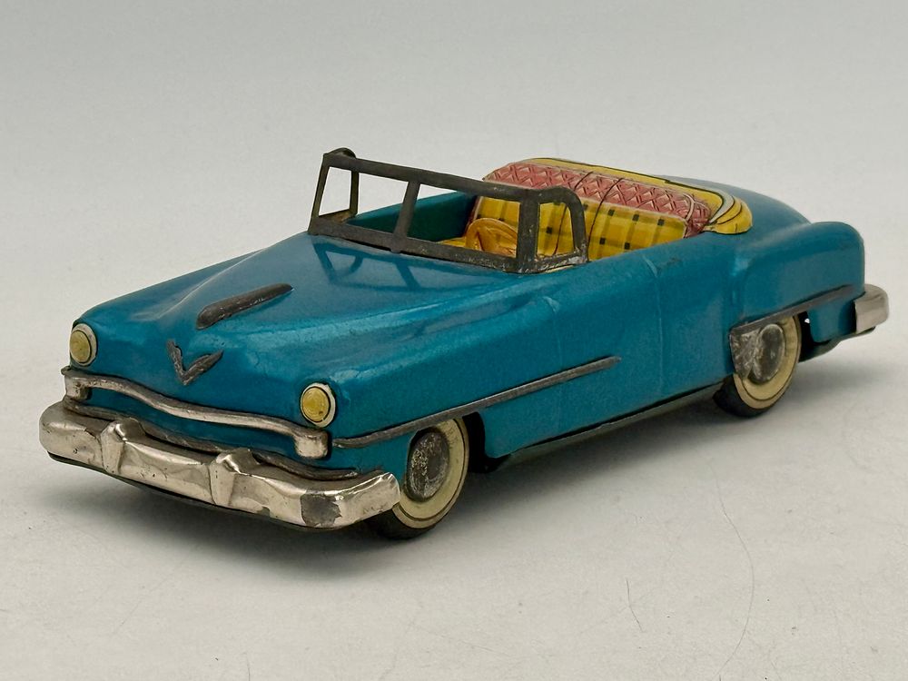 Lot 212: Sato1952 Tin Lithograph Chyrsler Convertible Friction Toy Car