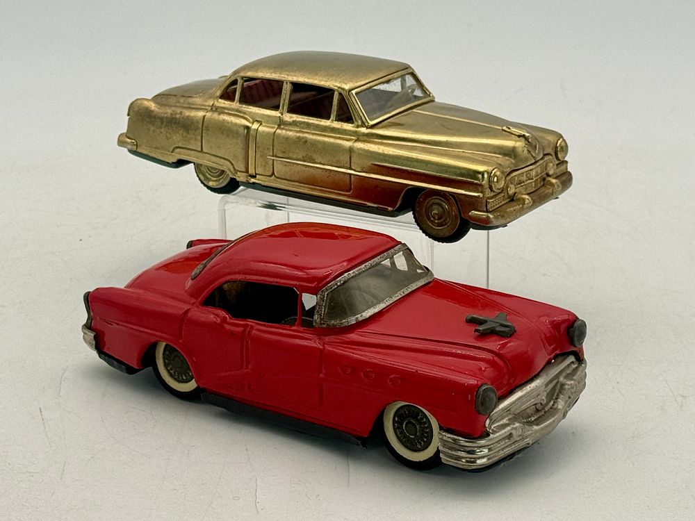 Lot 257: Two Japanese Tin Litho Toy Cars