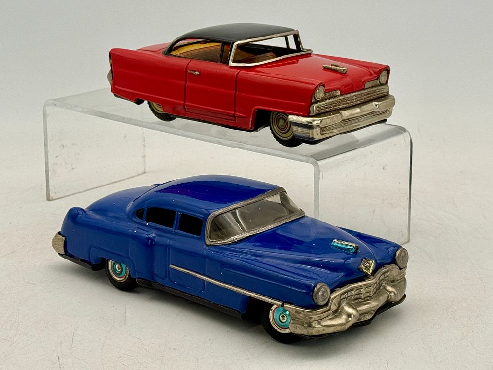 Lot 259: A Pair of 1950s Tin Toy Cars: Lincoln and Cadillac