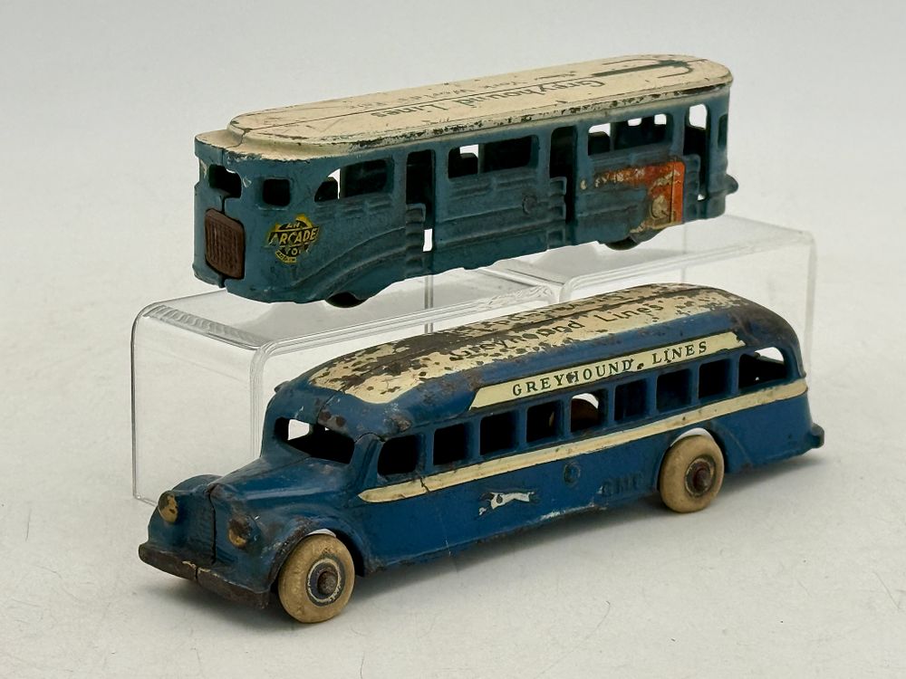 Lot 261: Two Arcade Cast Iron Greyhound Toy Buses