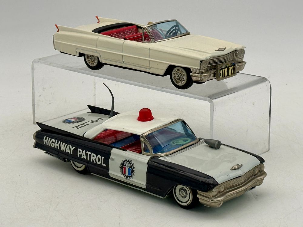 Lot 270: Two Cadillac Tin Toy Cars