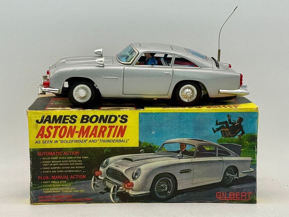 Lot 294: Gilbert James Bond Aston-Martin Toy Car with Reproduction Box