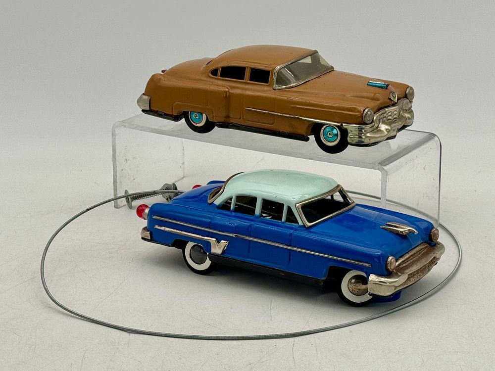 Lot 299: Two Japanese Vintage Tin Toy Cars