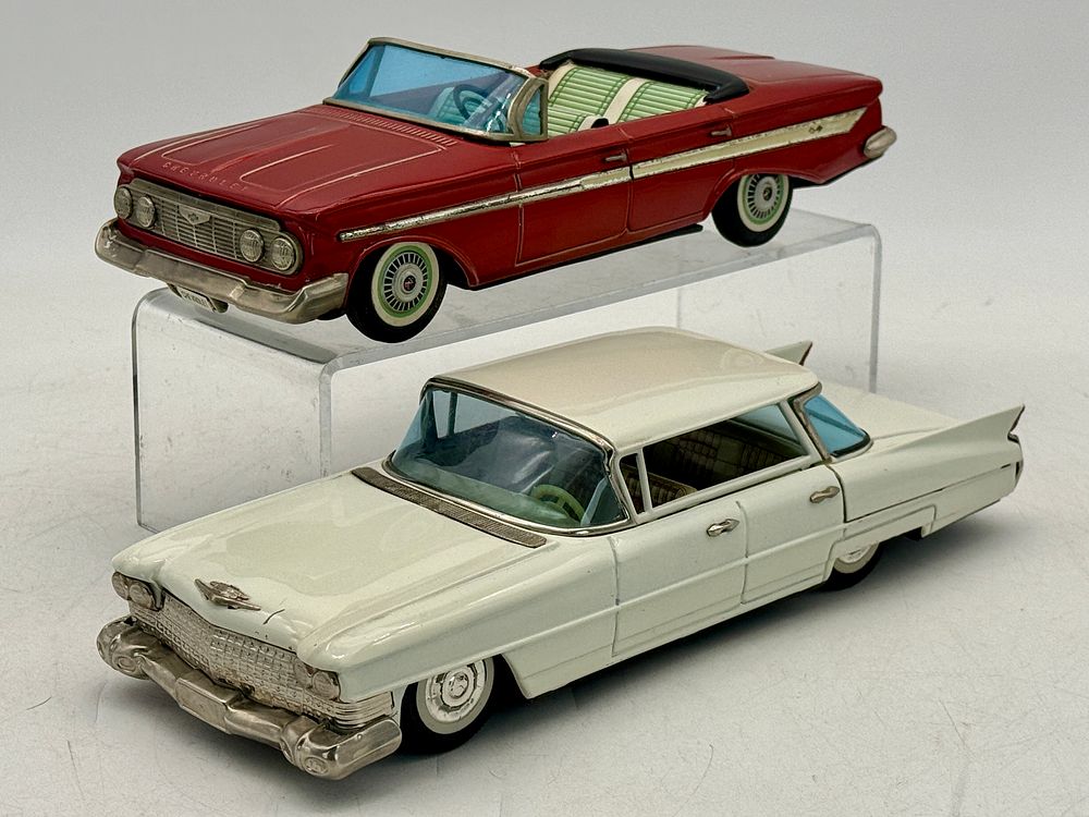 Lot 311: A Pair of Bandai Tin Toy Cars