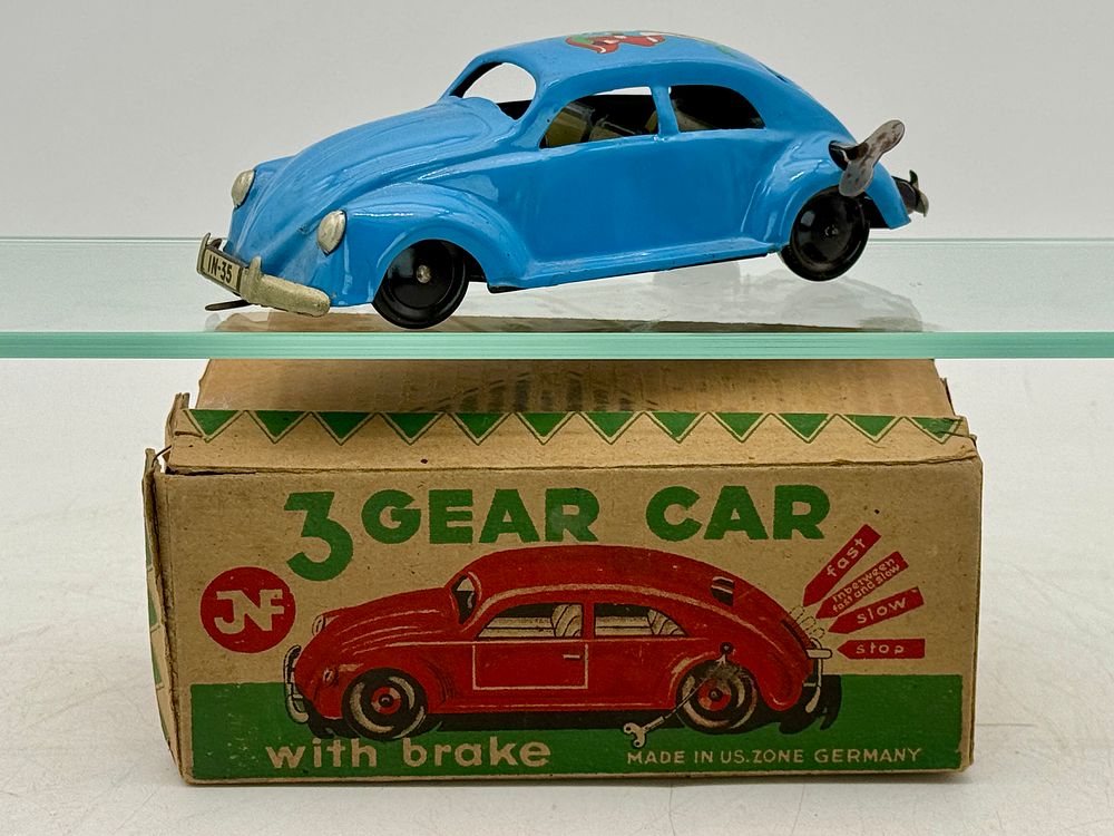 Lot 325: JN Tin Wind-Up 3 Gear Car with Brake and Original Box