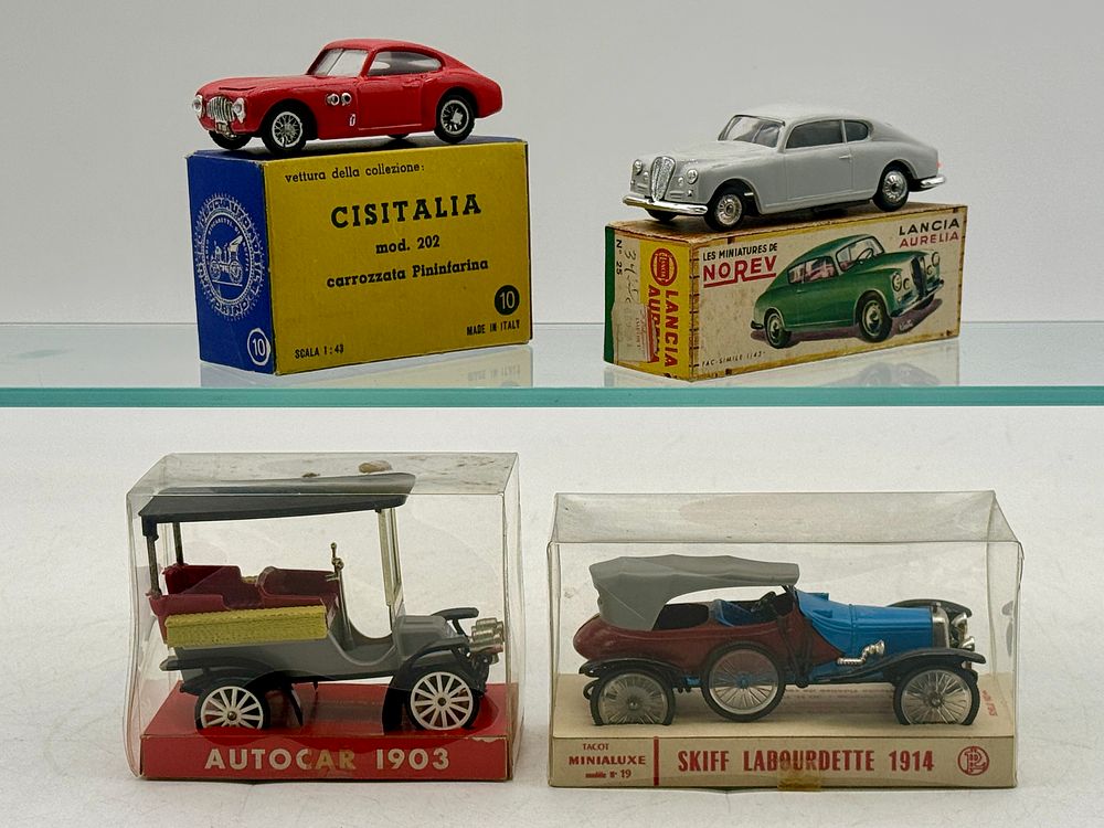 Lot 347: A Collection of Four Vintage Plastic Model Cars