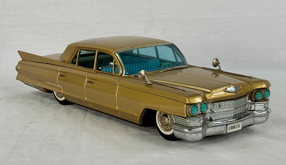 Lot 377: Large Bandai 1961 Japanese Tin Friction Cadillac Toy Car